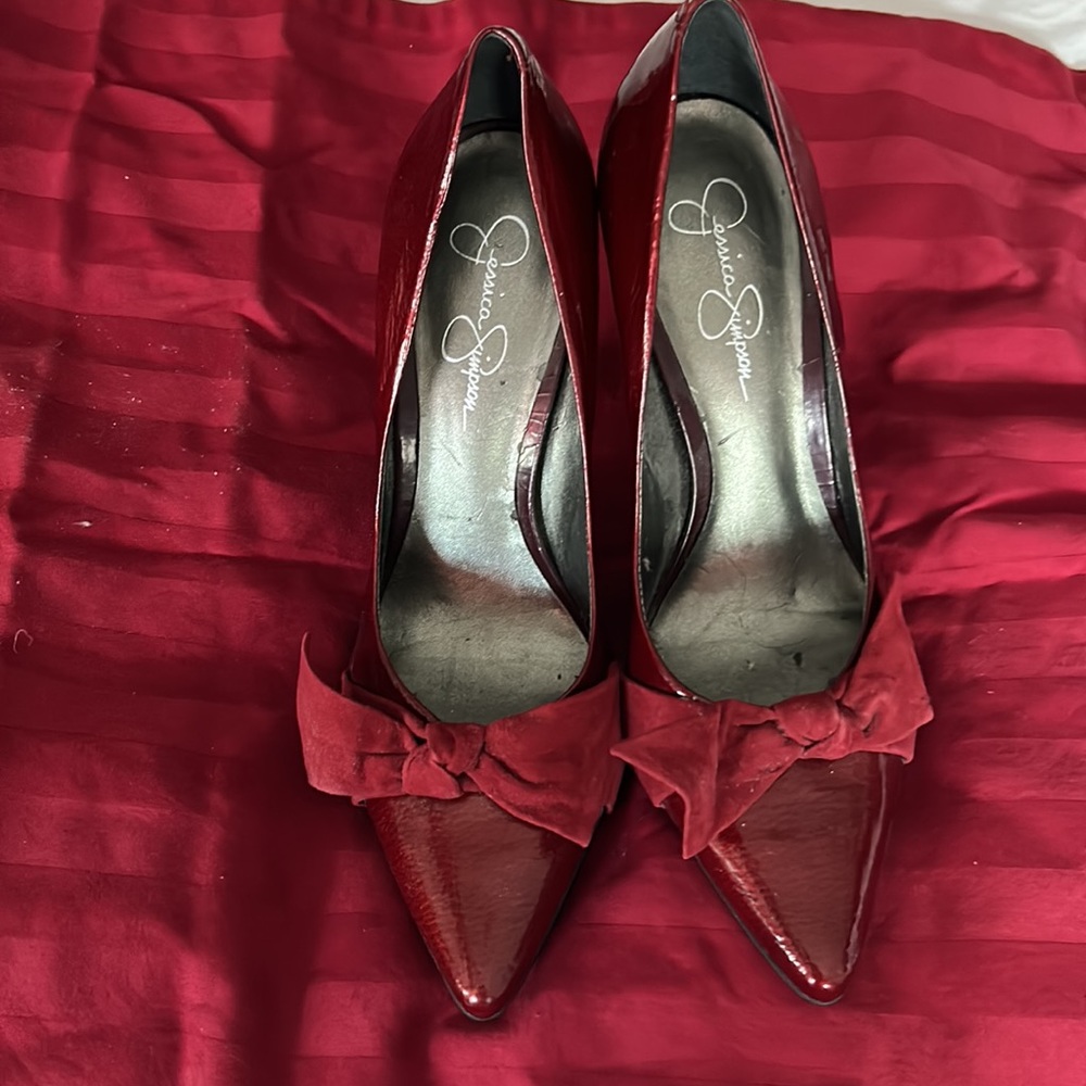 Red patent with bow high heel dressy shoe.